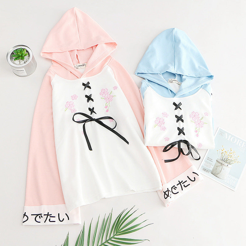 Long sleeve hoodie with bow tie